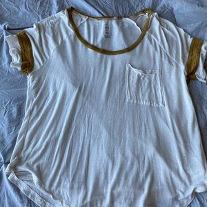 white shirt with gold rims